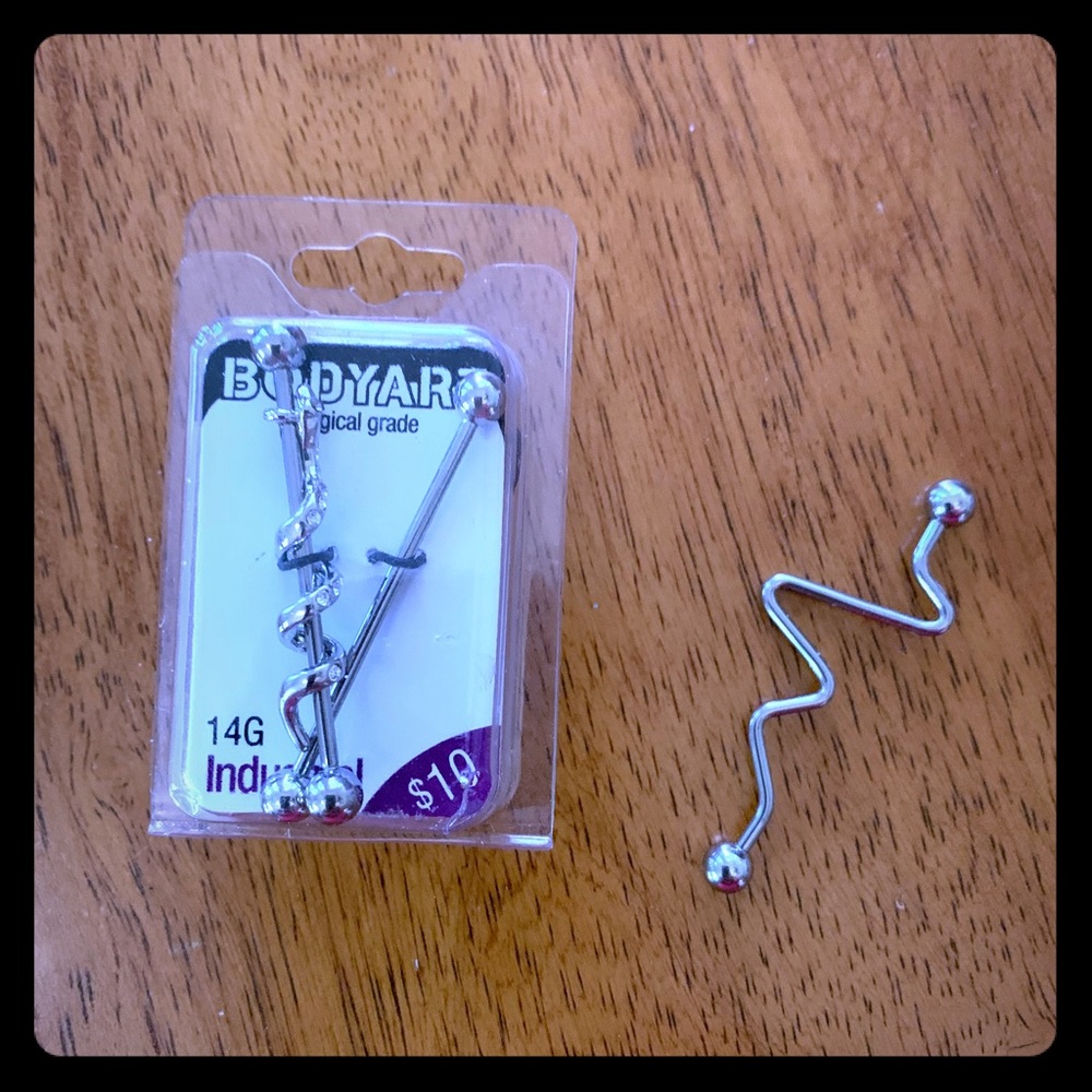 Three pairs of industrial pierced earrings